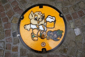 <strong>Qingdao, China<br></strong>A manhole cover near the Tsingtao beer brewery