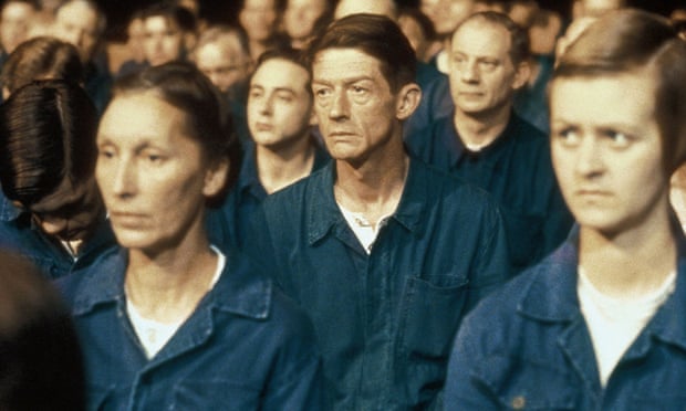 John Hurt (centre) as Winston Smith in the 1984 film version of Nineteen Eighty-Four directed by Michael Radford.