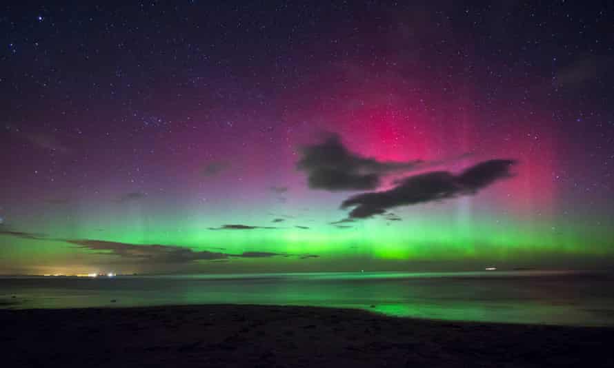 A view of the northern lights as seen from Bamburgh Castle Beach Northumberland, England. As stunning as the light show is on Earth, the one observed in the Lyra constellation is a million times brighter.