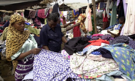 Kenyan women look for clothes at a second hand clothes market in Nairobi. (AP Photo/Khallil Senosi)