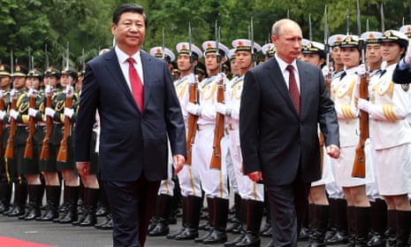 Xi Jinping welcomes Vladimir Putin to Shanghai last year