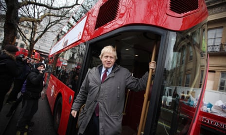 Mayor Boris Johnson travels on the “New Routemaster” bus in December 2011. The design mimics features of the iconic red Routemaster.