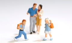 plastic figurines of parents and children