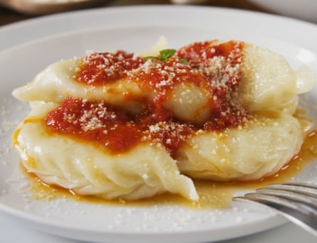 Culurgiones with potatoes, mint and tomato sauce.