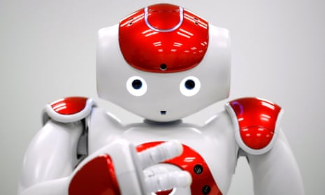 A NAO humanoid robot, developed by Softbank Corp. subsidiary Aldebaran Robotics SA, performs during a demonstration in Tokyo, Japan, on Wednesday, Jan. 28, 2015. Mitsubishi UFJ Financial Group Inc. unveiled the 58-centimeter (23-inch) humanoid on Monday to improve services for customers in Japan and become the first bank in the world to use robots at branches, it said. Photographer: Kiyoshi Ota/Bloomberg via Getty Images