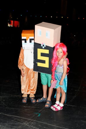 Left to right, River, Huck and Bijou Bond from Norfolk, aged six, nine and four, are dressed as Stampy, Cool Creeper, and Amylee33. 