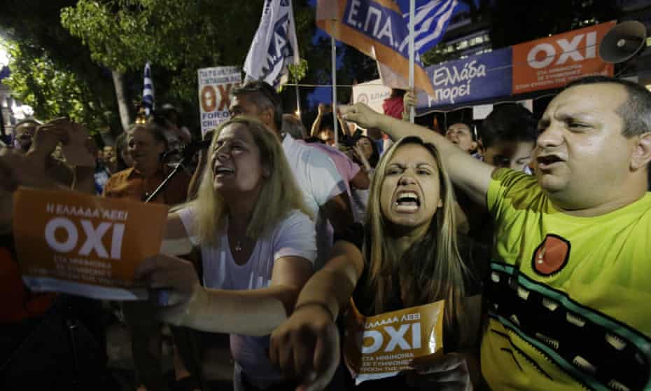 Supporters of the no vote at Syntagma Square in Athens react after early results of the referendum point towards victory.