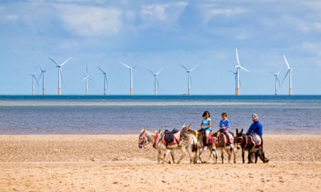 Offshore turbines seen from the beach at Skegness in Lincolnshire