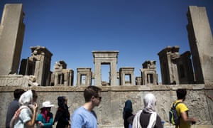 European and Iranian tourists visit the 2,500-year-old Tachara palace at Persepolis in Iran.