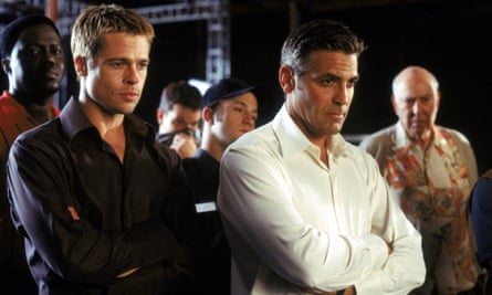 Brad Pitt, left, and George Clooney on the set of Ocean's Eleven in 2001.