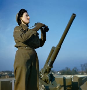 An Auxiliary Territorial Service spotter with binoculars at an anti-aircraft command post, December 1942