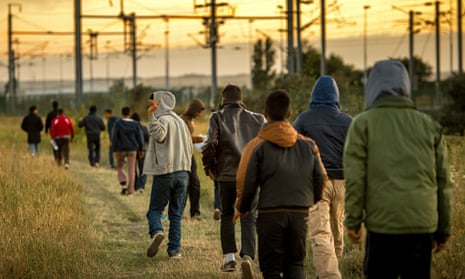 Migrants near Calais earlier this month.