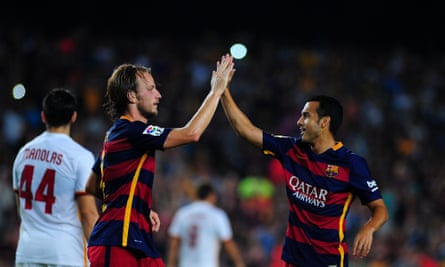 Barcelona's Ivan Rakitic, left, celebrates with Pedro during the recent game against Roma at Camp Nou.