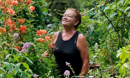 Marta Montañez stands in her garden in 9th Street Community Garden Plaza, at 9th street and Avenue C.