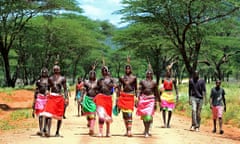 Men from the Samburu tribe walk to a festival in northern Kenya in 2012.
