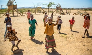 Child's play: nursery school children. Some 200 children live in the village.