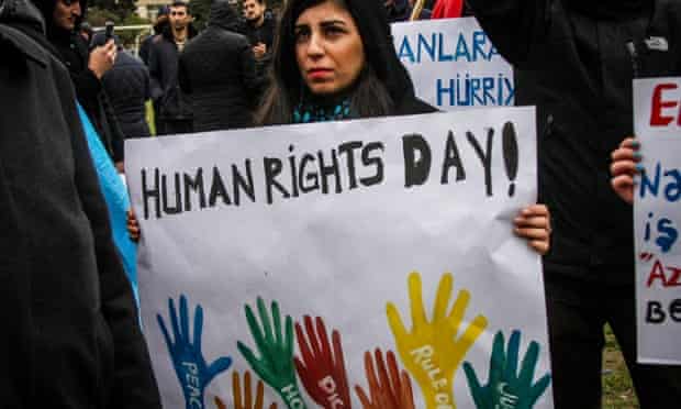 A protestor marks International Human Rights Day in Baku, Azerbaijan, back in 2014.