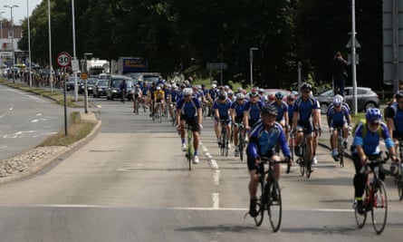 Cyclists, including members of Don Lock’s cycling club, Worthing Excelsior, accompany the hearse.