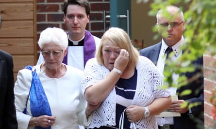 Maureen Lock, the widow of Don, 79, leaves Worthing crematorium with other mourners