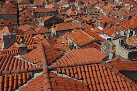 Roofs of Dubrovnik. The high vantage point (from the city wall) gives an unusual view of the town. The picture is dominated by the red-orange colour of the roof tiles, creating an almost abstract effect. It was deliberately framed to allow the nearest roof prevalence - this introduces more variation in scale which I think adds interest to the shot.