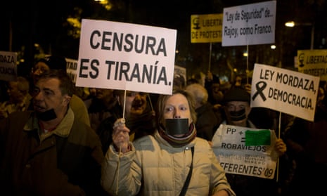 Spanish demonstrators protest against the new Citizen Security Law.
