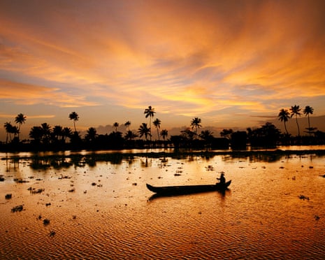 A canoe at dusk in the 'Backwaters' near Allepey in the Kerala region of India.