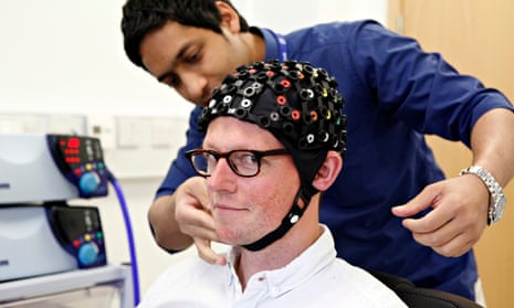 Tom Ireland tries out transcranial magnetic stimulation at the Institute of Neuroscience, Newcastle University.