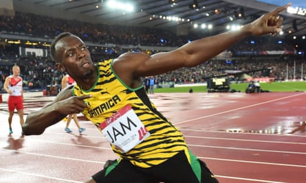 Jamaica's Usain Bolt poses after winning gold in the final of the Commonwealth Games 4x100m relay at Hampden Park, Glasgow, 2014.