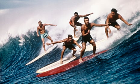 five men surfing