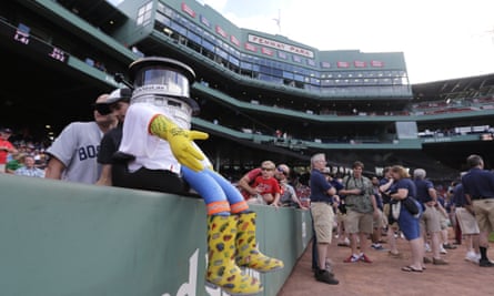 Hitchbot rests on a wall before a baseball game at Fenway Park between the Boston Red Sox and Detroit Tigers in Boston on 24 July.