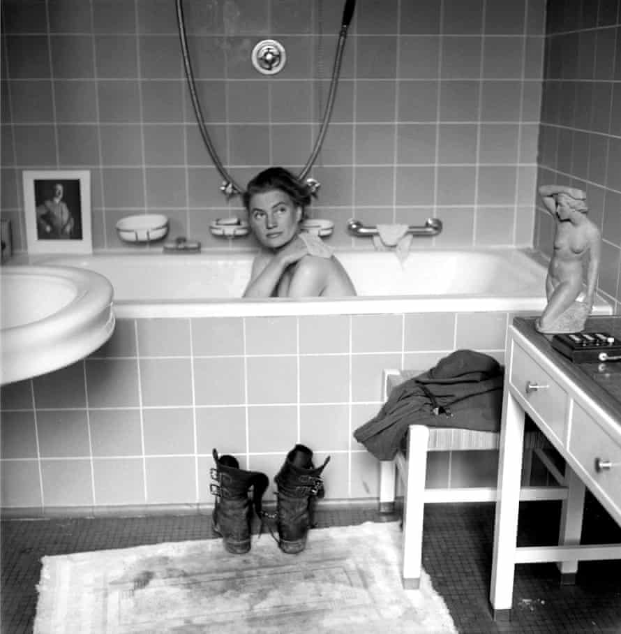 Lee Miller in Adolf Hitler's bath, Munich, 1945.
