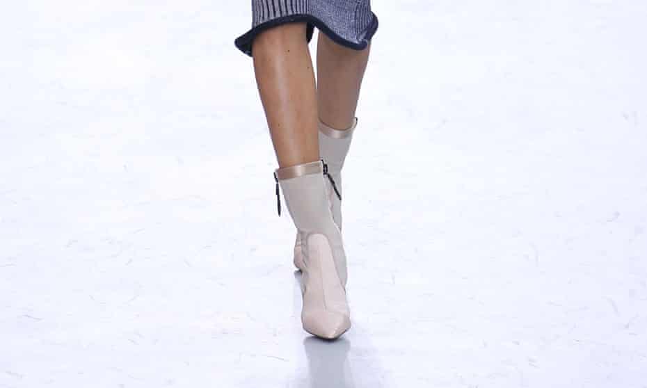 A model in midis on the Louis Vuitton Autumn Winter 2015 catwalk