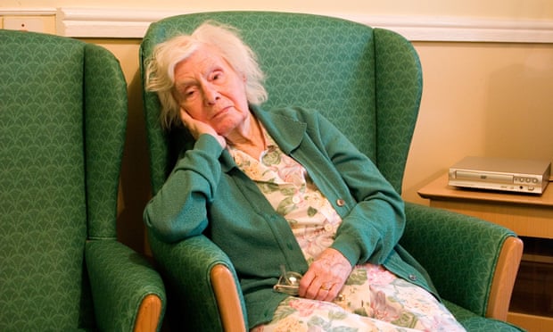 older woman in armchair