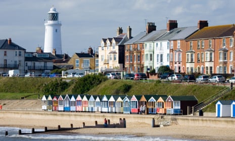 The lighthouse and beach huts at Southwold, Suffolk.