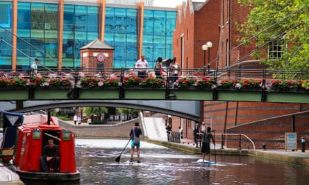 Paddleboarding along the canals of Birmingham's former industrial district