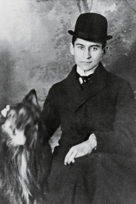 Franz Kafka, with a dog, in 1905.