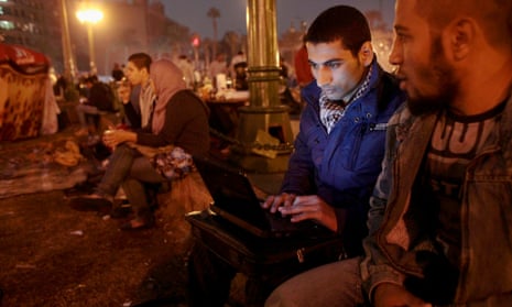 Protesters with laptop on in Cairo, Egypt. The government has announced a new site to counter foreign media's 'partial truths'