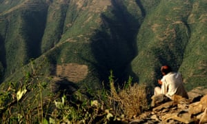 A man reads a book in Tigrinya, in Eritrea.