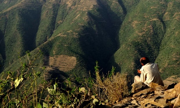 A man reads a book in Tigrinya, in Eritrea.