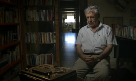 Israeli writer and six-day war veteran Amos Oz listens to a tape of his earlier self in the documentary Censored Voices.