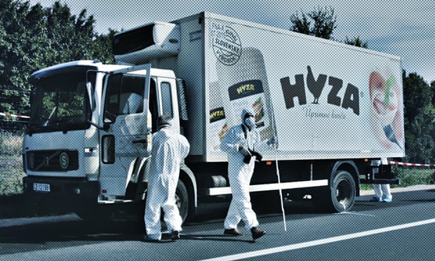 Forensic police officers inspect the truck in which up to 50 migrants were found dead on a motorway 