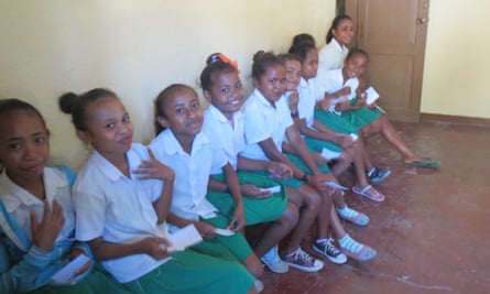 Timor Leste schoolgirls lining up for dental treatment.