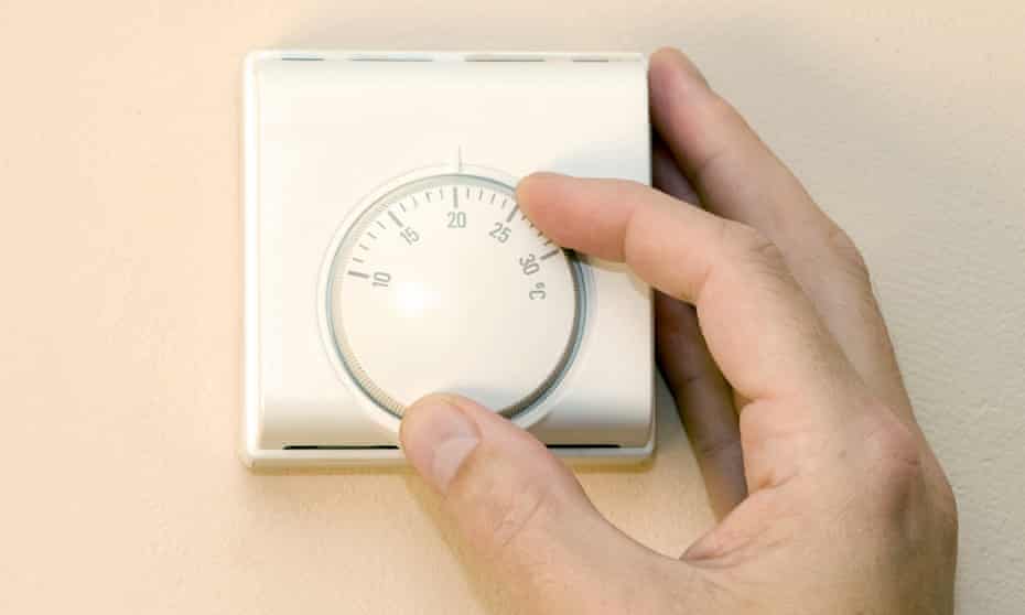 Man with thermostat