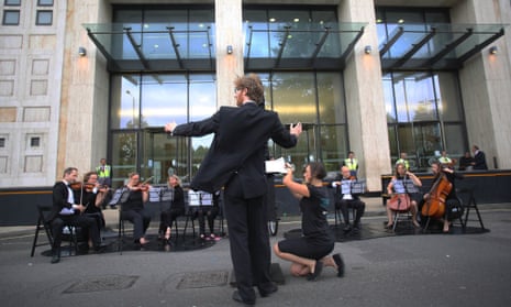 The Crystal Palace Quartet and supporting musicians perform orchestral protests against Arctic drilling outside Shell’s offices on the South Bank, London.