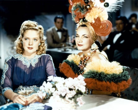 Carmen Miranda (right) sitting next to Alice Faye in a scene from 1941 film Week-End In Havana.
