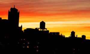 The iconic silhouettes of water tanks at sunset on Manhattan’s Upper West Side.
