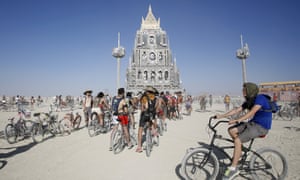 Festivalgoers gather at the Totem of Confessions at Burning Man.