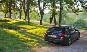 Car parked in a woods