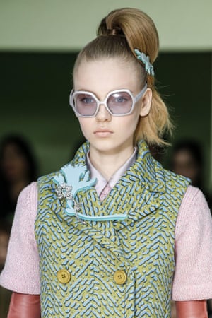 At brooch at the Prada show