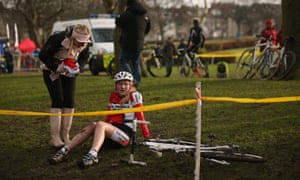 young girl with racing bike and her mother